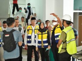 Tiga Pembangunan Gedung